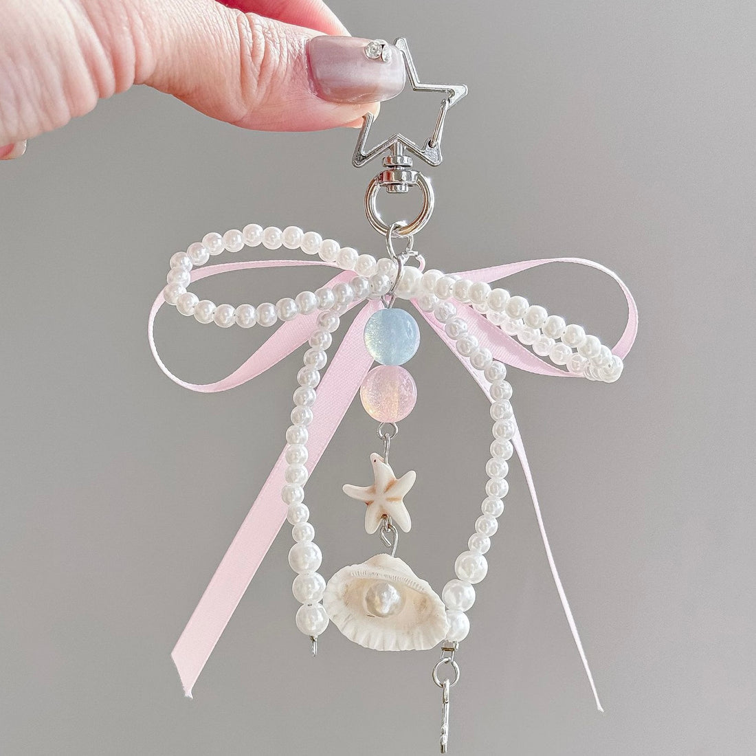 Pearl Cove Bow Charm Phone Case With Hanging Bow Charm